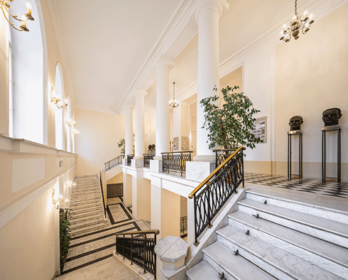 Second floor lobby with a staircase